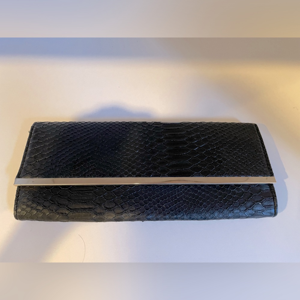 Black faux snake skin style clutch